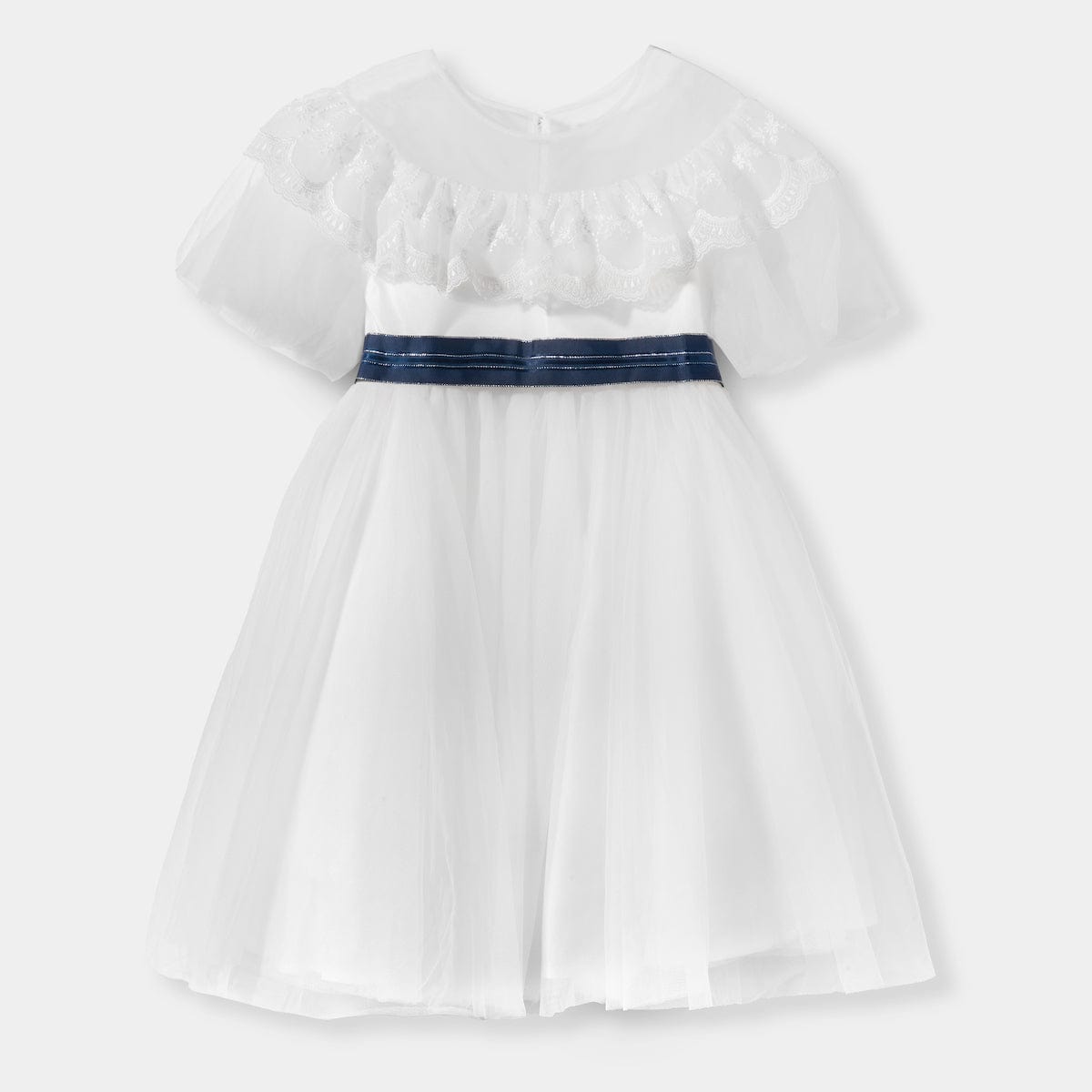 Girl in a white tulle and lace flower girl dress at a garden wedding, Mi Regalia