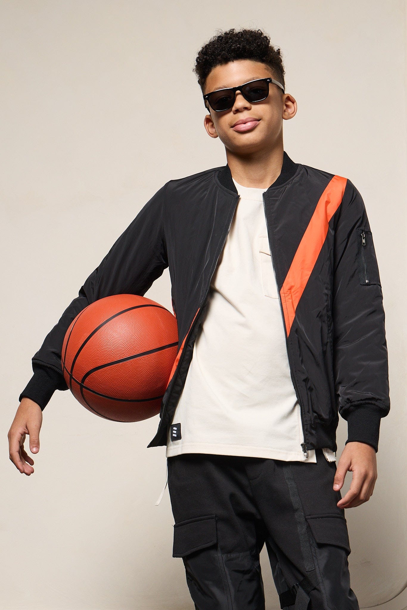 Mi Regalia Jacket Black Bomber Jacket with Orange Stripe – Luxury Kids Twill Outerwear with Satin Lining & Sporty Detailing (Sizes 5Y–10Y) Black Bomber Jacket | Luxury Kids Outerwear with Stripe