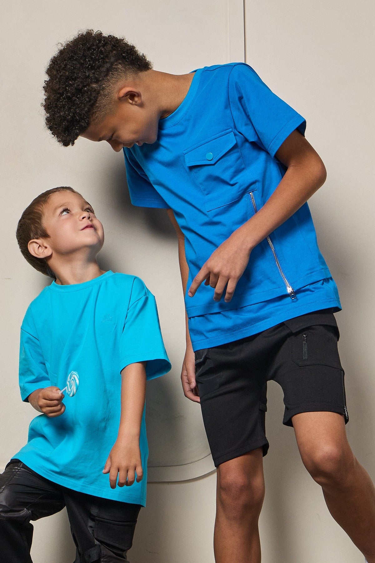 Mi Regalia Shorts Aris Black Utility Drop Crotch Shorts – Luxury Kids Utility Shorts with Satin Panels &amp; Utility Zippers Urban Utility Cargo Shorts | Luxury Kids Streetwear